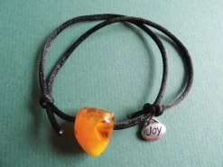 Tradera ARMBAND svart silk snodd med bumling Man Made Amber UNISEX> Armbånd
