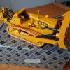 Tradera Caterpillar bandtraktor, Conrad 1:50| Skalamodeller