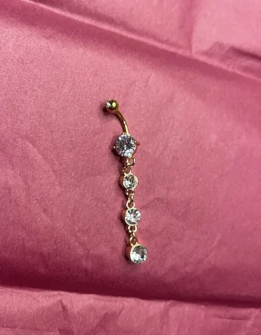 Tradera Guldfärgad navelpiercing> Piercinger