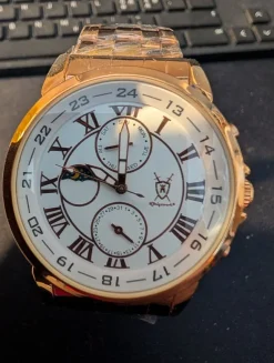 Tradera Herrarmbandsur i Roséguld med Kronograf och Månsfas> Armbåndsure