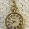 Tradera Klocka hängklocka guldpläterad> Andet Urrelateret