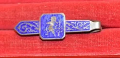 Tradera ÄLDRE SLIPSHÅLLARE MED EMALJERAD DEKOR. STERLING SILVER> Slipsenåle