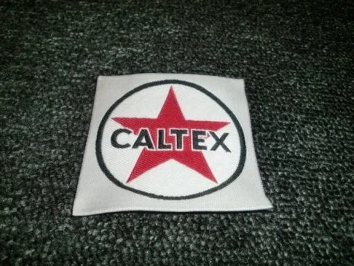 Tradera ÄLDRE TYGMÄRKE CALTEX| Bensinia