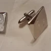 Tradera manschettknappar silverfärgad metall 20x20 cm !> Andre Smykker