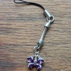 Tradera Mobilsmycke nyckelring sterling silver 925 fjäril lila stenar> Andre Smykker