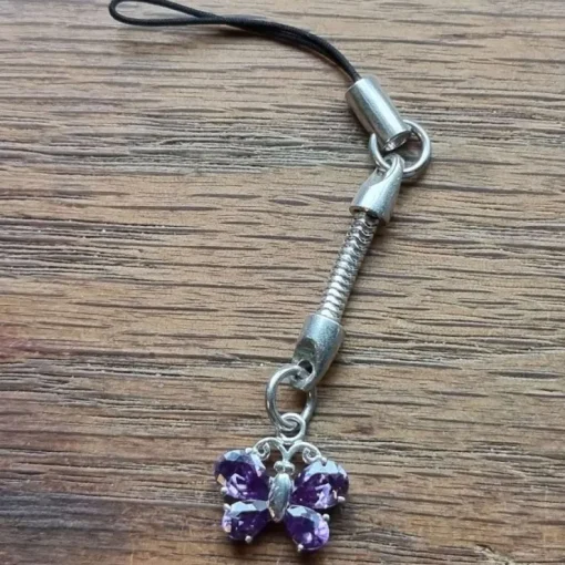 Tradera Mobilsmycke nyckelring sterling silver 925 fjäril lila stenar> Andre Smykker