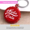 Store Nuka-Cola Inspired Red Bottle Cap Keychain - Fallout Game Series Car Keyring Stofmærker & Pins