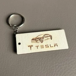 Tradera Nyckelring med Gravyr i ljust trä - Tesla| Merchandise