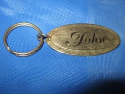 Tradera NYCKELRING MED NAMN (JOHN) MÄSSING> Nøgleringe