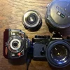 Tradera Olympus OM-System kamera med tillbehör| Fotokameraer