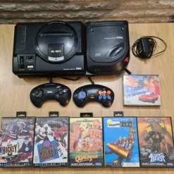 Tradera Sega Mega Drive + Mega-CD + 6st spel + 2st handkontroller> Sega
