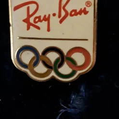 Tradera Säljer en Ray-Ban Olympisk Reklampins> Olympia